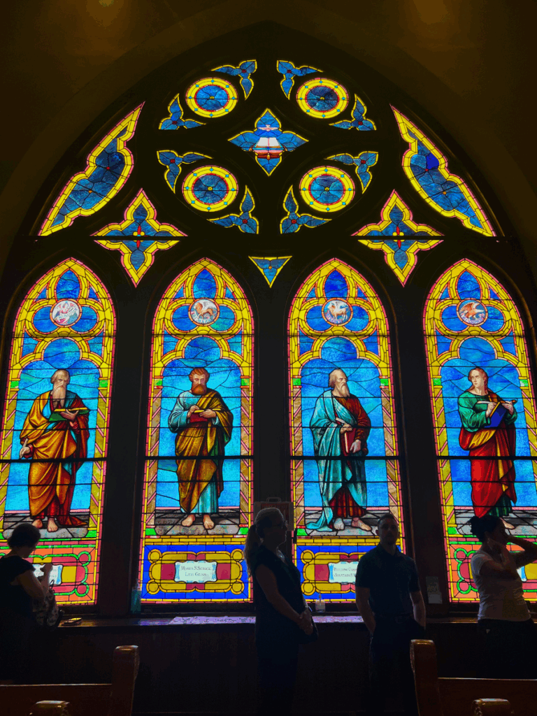 Friedens Church features impressive stained-glass windows. In the main service room, this installation stretches from the floor to the ceiling.